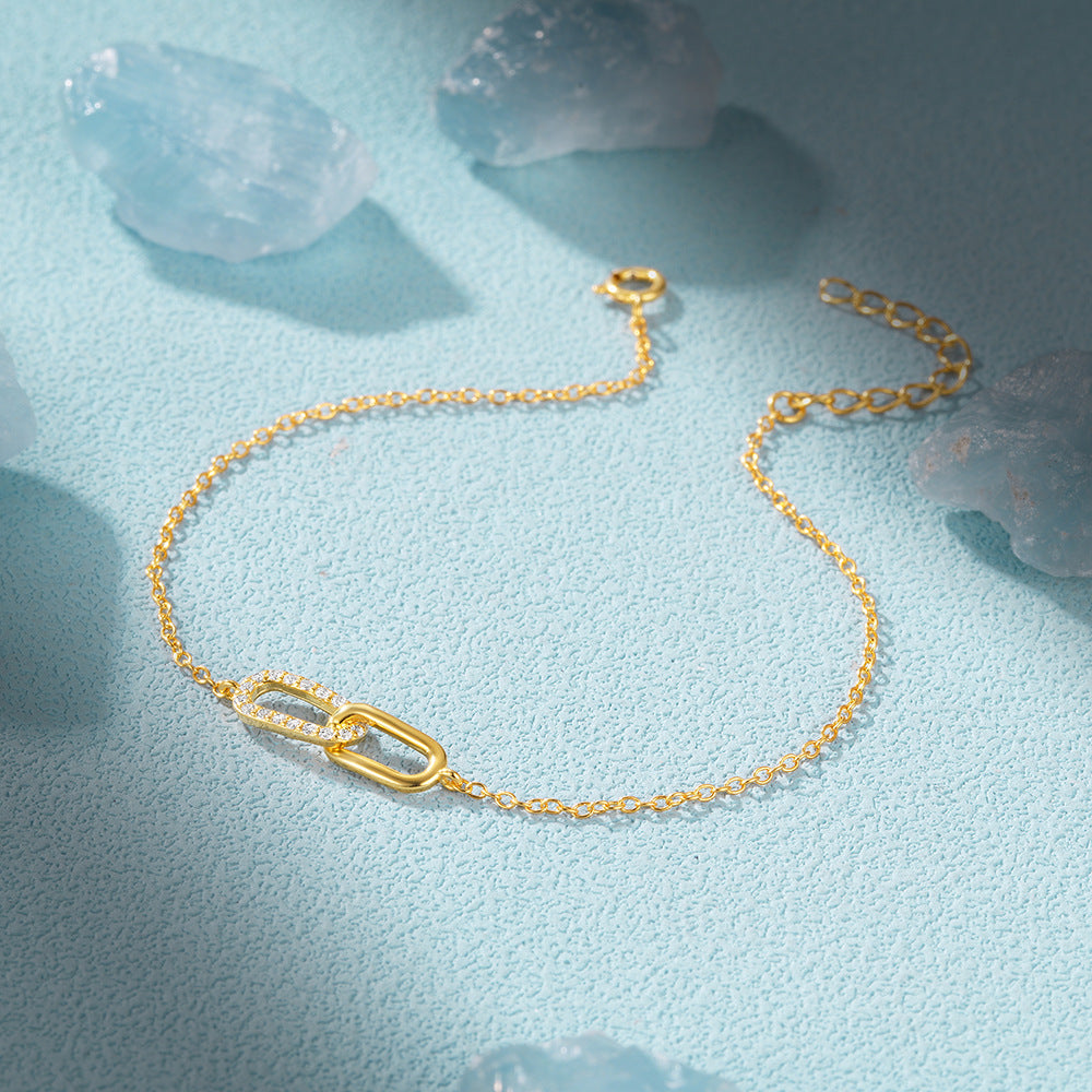 Bracelet Double Boucle Croisée – Édition Prestige